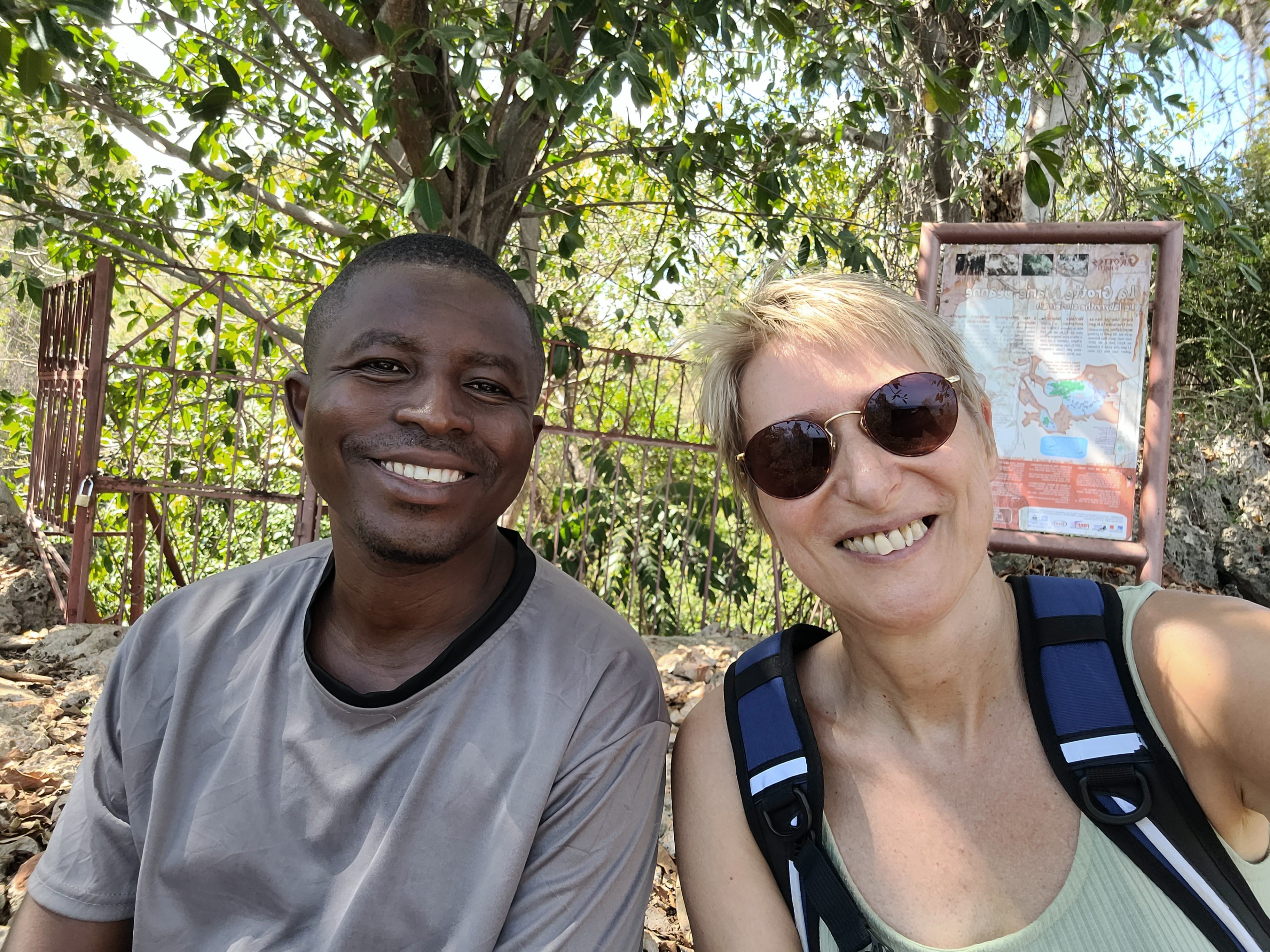 My good friend Aimé and me at the entrance of the cave