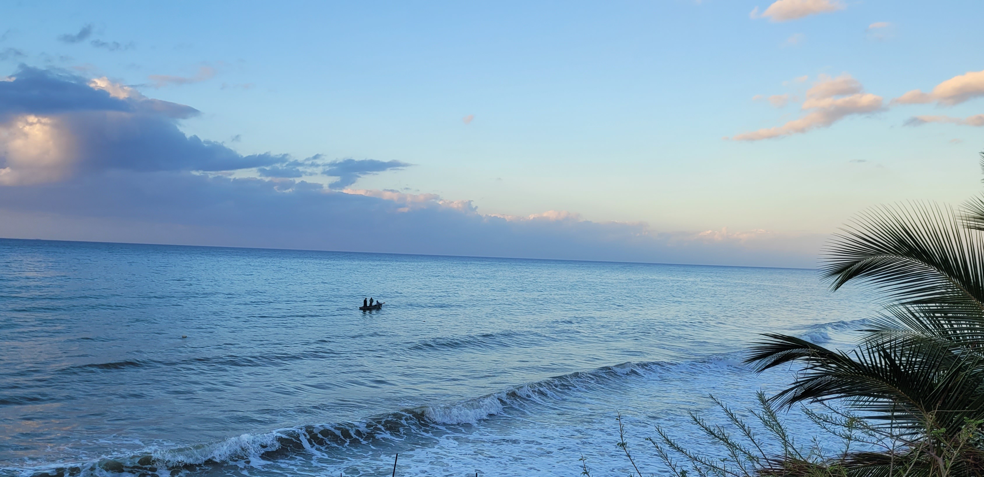 Fishermen early in the morning on their way to collect their nets